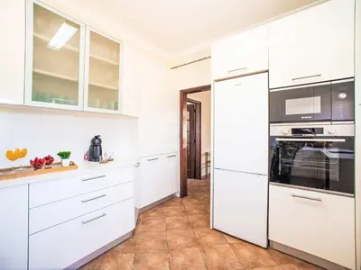 a living room with a couch and a tv at Holiday Home Casa do Sol by Interhome in Patroves
