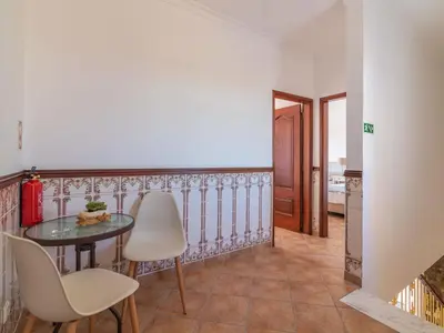 a villa with a swimming pool and lawn at Holiday Home Casa do Sol by Interhome in Patroves