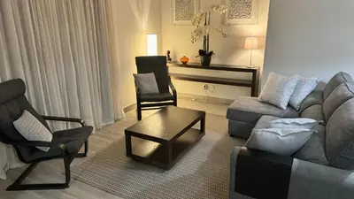 two beds in a small room with at Casa Sol Corcovada in Albufeira