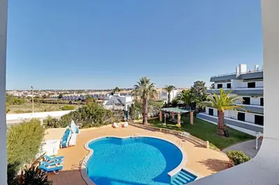 an overhead view of a swimming pool in a resort at Albufeira Delight with Pool by Homing in Guia