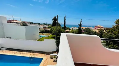 a view from the balcony of a house with a swimming pool at El Gharbe by Check-in Portugal in Albufeira