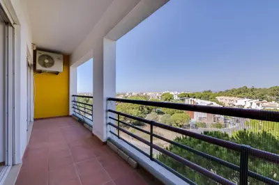 a balcony with a view of the city at Village Atlântico Apartment in Vilamoura