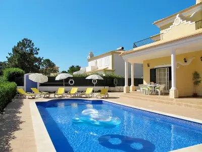 a swimming pool in the backyard of a house at Holiday Home Vila Sol by Interhome in Cabeço de Câmara