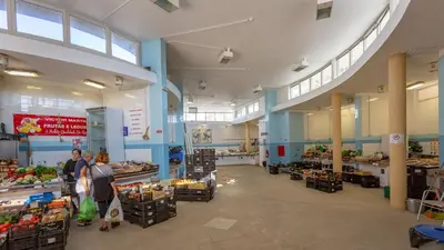 two people standing in a grocery store aisle at Greice Homes-Apartamento 2 quartos, Monte da Balaia, Olhos de Água, Albufeira in Olhos de Água