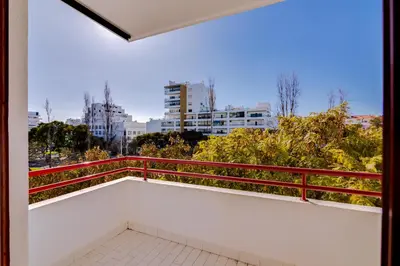a balcony with a view of the city at Varandas do Mar - Near the beach - Quarteira in Quarteira