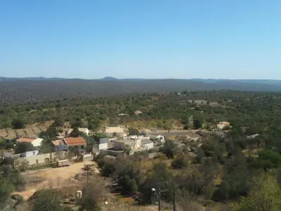 an aerial view of a small village with trees at Casa Adega - Quinta Amoreira in Faro