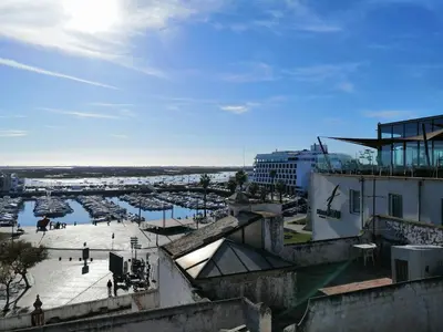 a view of a harbor from a building at The Portuguese Element in Faro