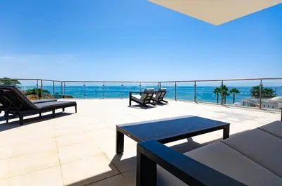 a patio with a view of the ocean at Penthouse Apartment, Superb sea view 1 Bedroom, Verandas do Mar AT02 in Albufeira