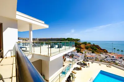 a view of the ocean from the balcony of a resort at Penthouse Apartment, Superb sea view 1 Bedroom, Verandas do Mar AT02 in Albufeira