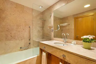 a bathroom with a sink and a shower at AL - Apartamento Vila Sol F5 E in Vilamoura