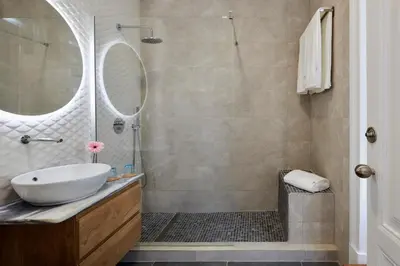 a bathroom with a sink and a shower at Pereiras House of Charm - Downtown in Faro