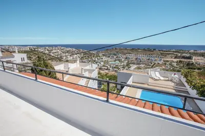 a view of the city from the balcony of a house at Villa Marrachinho in Albufeira