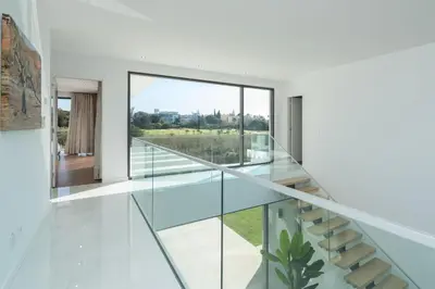 a glass house with a view at Colinas do Golfe Vilamoura Sun by SAPvillas in Vilamoura