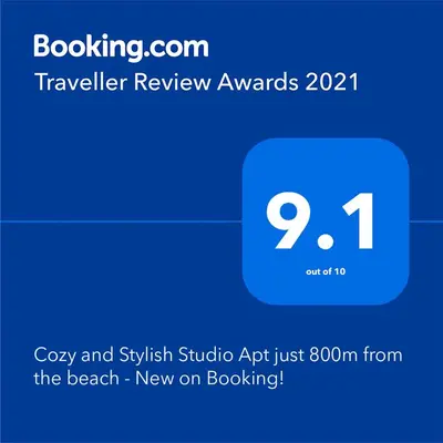 a screenshot of a phone with the beach new on booking at Cozy and Stylish Studio Apt - just 800m from the beach in Albufeira