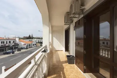an empty balcony with a view of a street at Vila de Santa Eulália - Albufeira in Albufeira