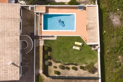 an overhead view of a house with a swimming pool at Vila de Santa Eulália - Albufeira in Albufeira
