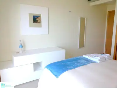 a little lamp sitting on a counter in a room at Bright apartment with sea view in Albufeira - 62 m², Pool in Albufeira