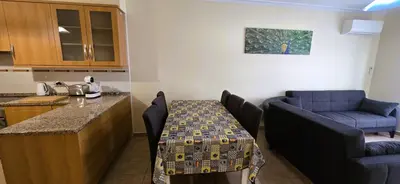 a bedroom with a blue bed in a room at Open Space - Albufeira in Albufeira