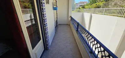 a hotel room with two beds and two lamps at Open Space - Albufeira in Albufeira