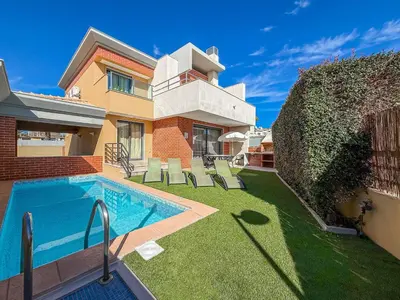 a house with a swimming pool in front of it at V4, Villa Jardins Branqueira2 near Beach, Albufeira in Albufeira