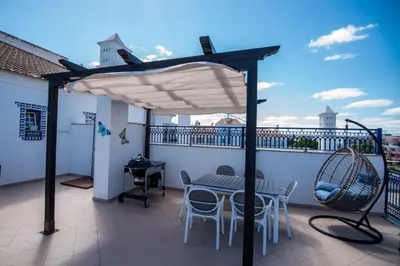 a bathroom with a toilet and a tub and a sink at Charm Apartment T2 All With Big Terrace Albufeira Self check-in in Albufeira