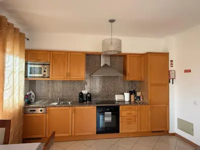 a bedroom with a bed and a window at Charm Apartment T2 All With Big Terrace Albufeira Self check-in in Albufeira