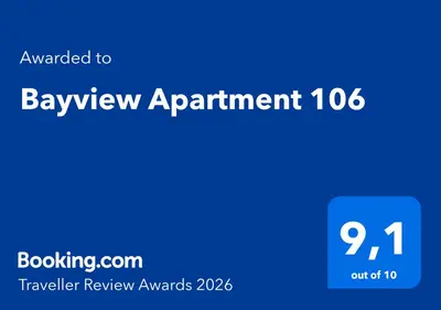 a blue sign with the words bayeview appointment at Bayview Apartment 106 in Albufeira