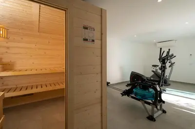 a room with a sauna and a treadmill at Victoria Lux by SAPvillas in Vilamoura