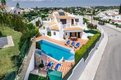 an aerial view of a house with a swimming pool at Amizade by Algarve Villa Holidays in Albufeira