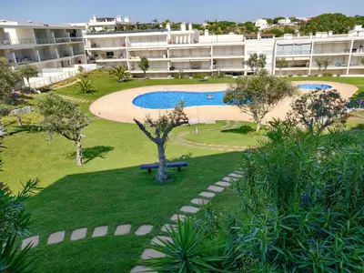 an apartment complex with a pool and a park at Monte da Balaia Prime by Sunny Deluxe in Albufeira