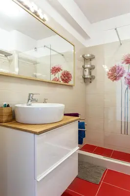 a bathroom with a sink and a shower at Magic Theatre Faro Center in Faro