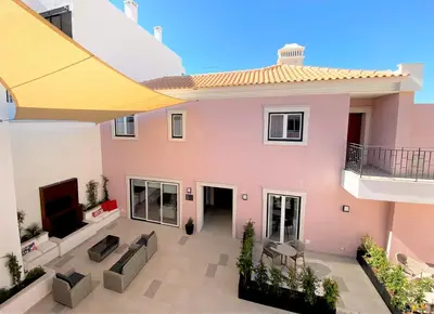 a view of a house with a patio at Cardeal Suites & Apartments in Faro