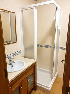 a bathroom with a shower and a sink at Vilamoura, Marina Sol T1 in Quarteira