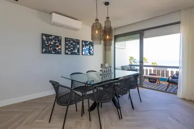 a bathroom with a sink and a shower at Quarteira Beach Stunning Apartment in Quarteira