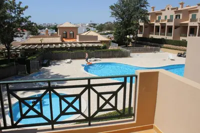 a view of the pool from the balcony of a resort at Villa V2 Z in Olhos de Água