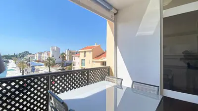 a balcony with a view of a city at Penthouse Duplex Marina Plaza T1 HsR Marina Vilamoura in Vilamoura