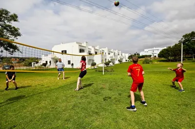 a group of people playing a game of soccer at Albufeira Club 98 - O refúgio perfeito in Albufeira