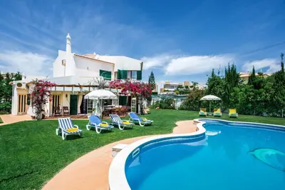 an image of a villa with a swimming pool at Villa Hideaway by Algarve Villa Holidays in Galé