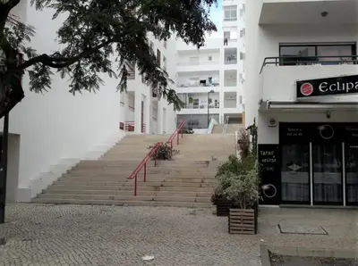 a set of stairs in front of a building at Varandas do Mar 3- Remodelado, Wifi, 150mt Praia in Quarteira