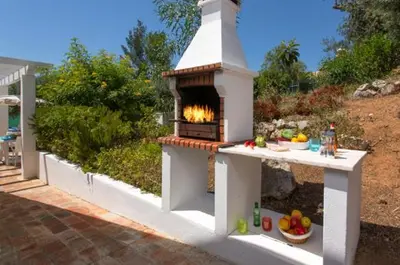 a cobblestone street with a group of shops at Villa EP in Albufeira