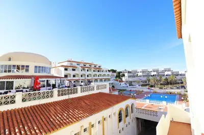 a view of the pool from the balcony of a resort at Bellavista Jardim By BeGuest in Albufeira