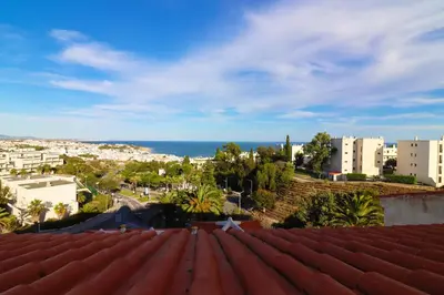 a view of the ocean from the roof of a building at Bellavista Jardim By BeGuest in Albufeira