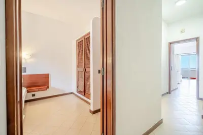 a hallway with a door leading to a room at Bellavista Jardim By BeGuest in Albufeira