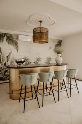a dining room with a table and chairs at Granvila in Quarteira