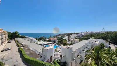 a view of the city and the ocean from a building at Apartamentos Praia da Oura by Sunny Deluxe in Albufeira