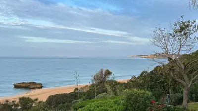 a view of a beach and the ocean at Beira Mar by Check-in Portugal in Albufeira
