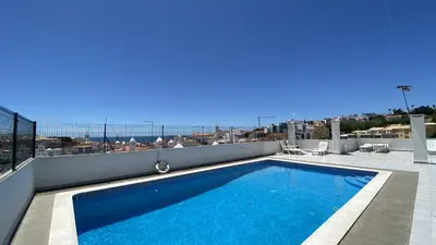 a swimming pool on the roof of a building at Rooftop by Check-in Portugal in Albufeira
