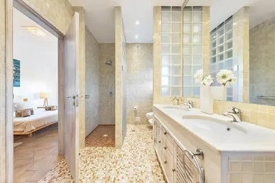 a bathroom with a sink and a shower at Villa Dome by OCvillas in Albufeira