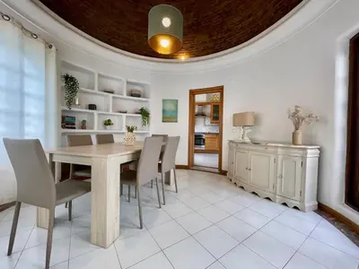 a dining room with a table and chairs at Villa Cristina 9 in Albufeira