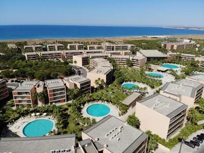 an aerial view of a resort with two swimming pools at Ambassador Salgados Beach Suites in Albufeira